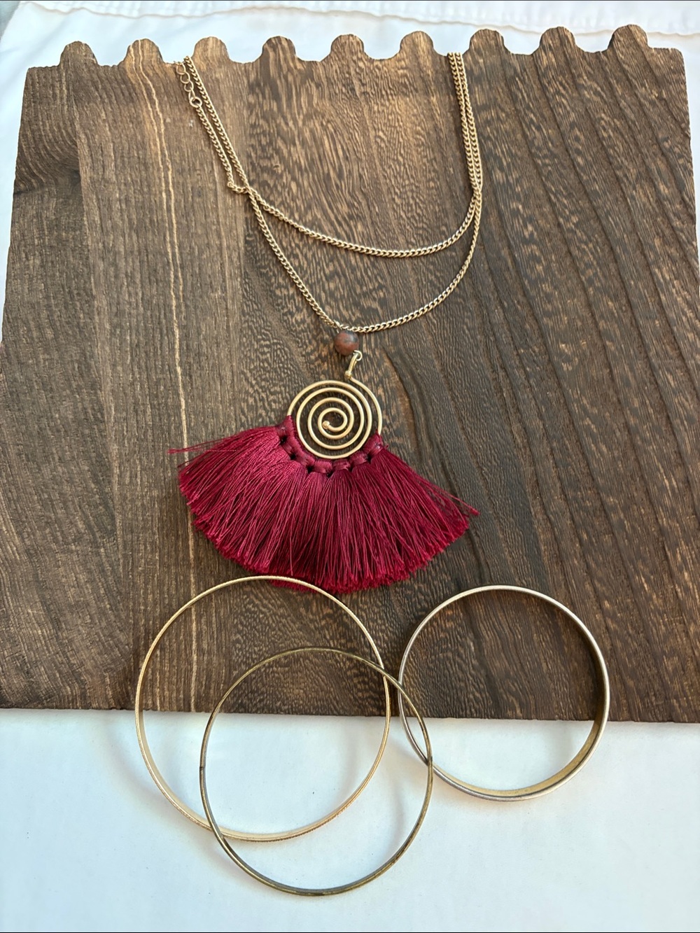 Gold-Tone Necklace with Burgundy Tassel Pendant and Bracelets